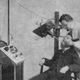 Photo of a dentist working on a patient near an X-ray machine, from the December 1909 issue of Popular Electricity